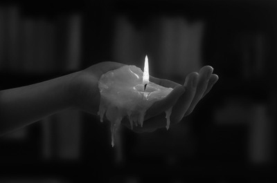 black-and-white-candle-fire-flame-in-hand-hot-wax-Favim.com-53681